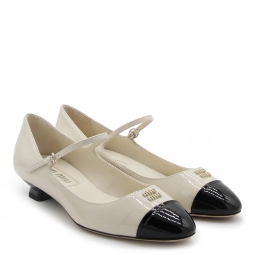 IVORY AND BLACK LEATHER FLATS