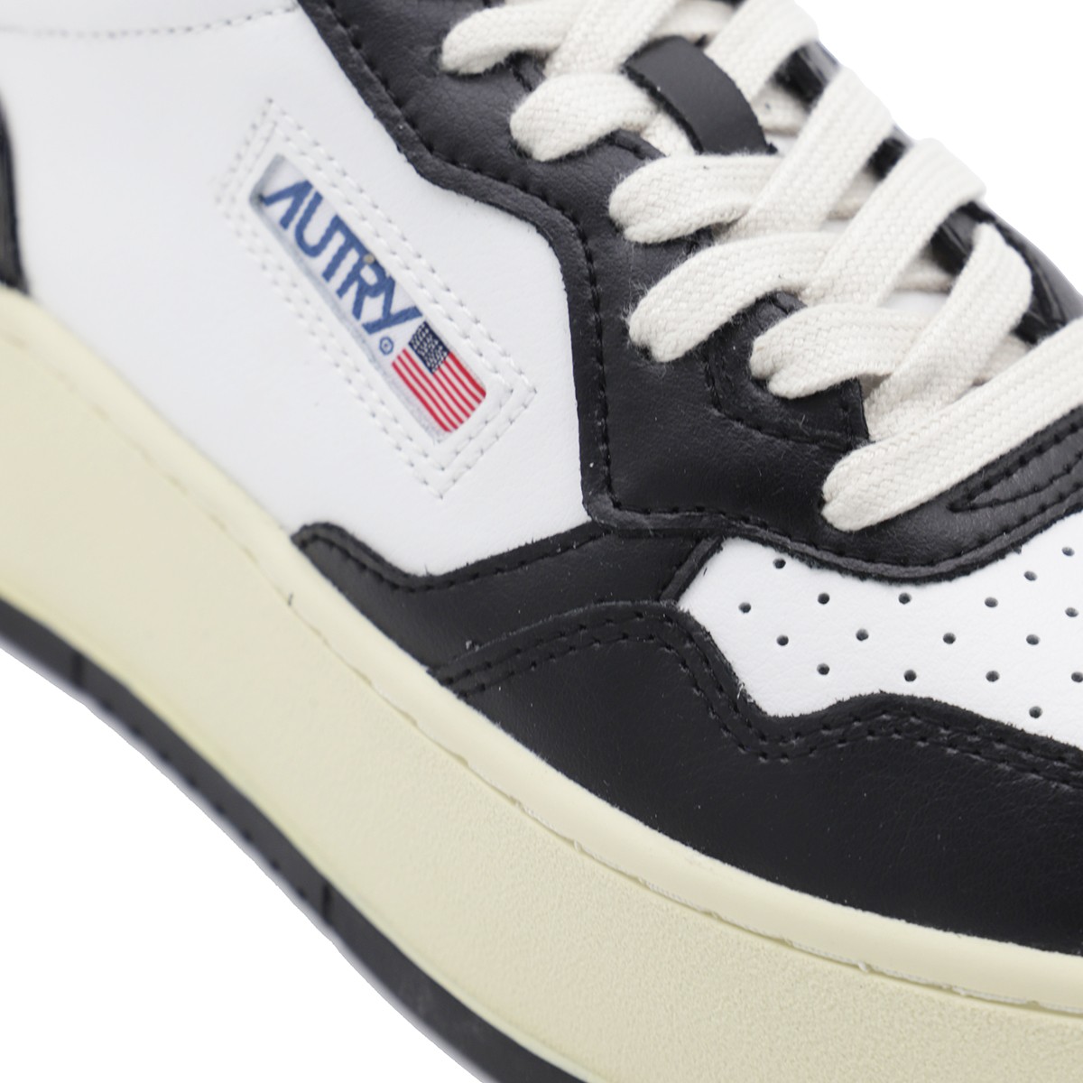 BLACK AND WHITE SNEAKERS