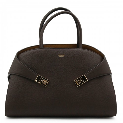 BROWN LEATHER HUG TH M TOP HANDLE BAG