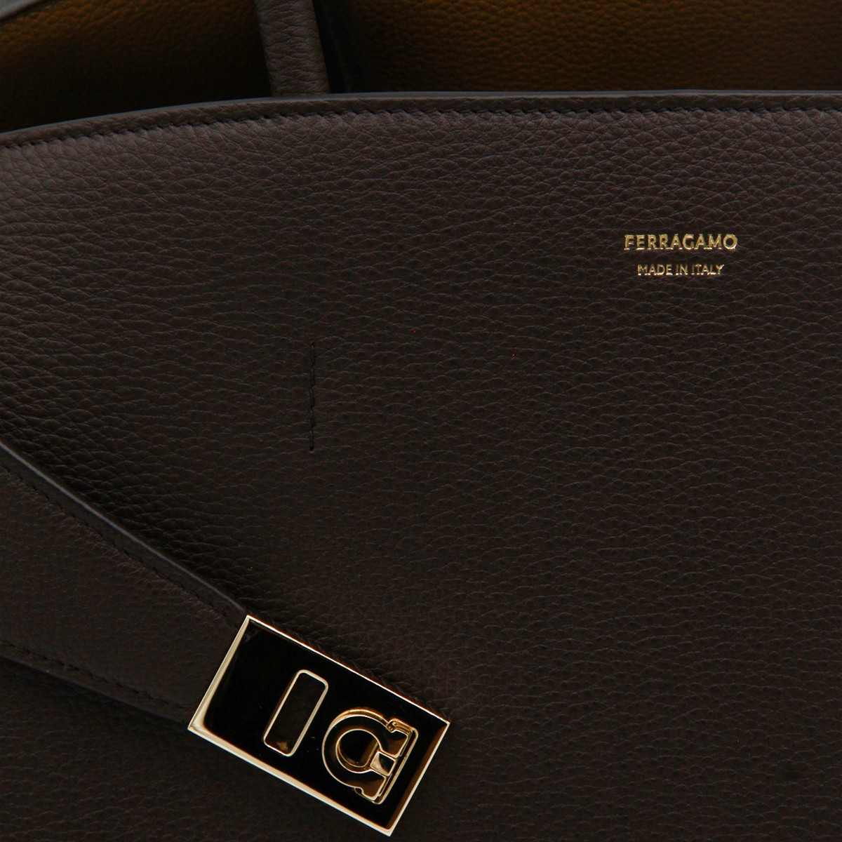 BROWN LEATHER HUG TH M TOP HANDLE BAG