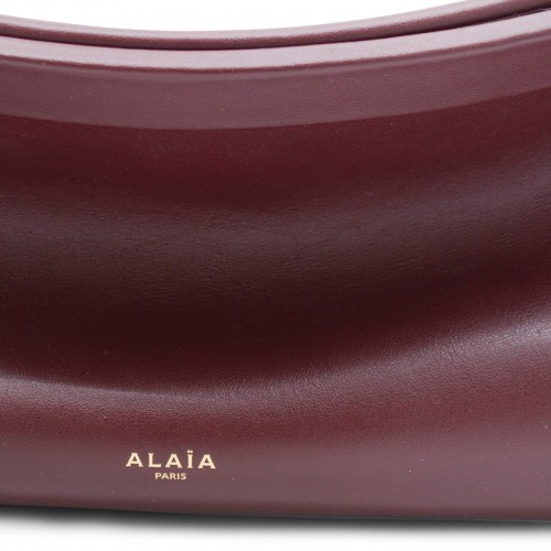 RED LEATHER EAST WEST MEDIUM CROSSBODY BAG