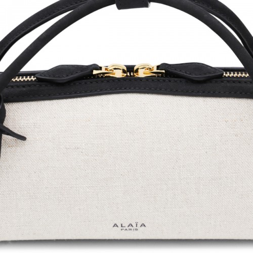 BEIGE AND BLACK LEATHER LE TECKEL CLUTCH