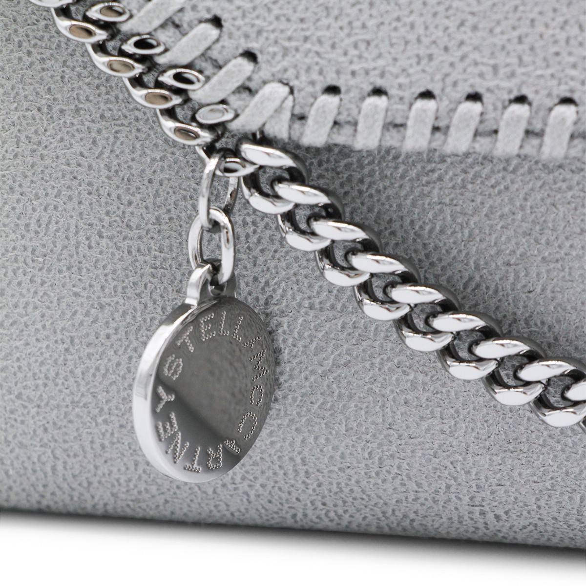 LIGHT GREY FAUX LEATHER CONTINENTAL...