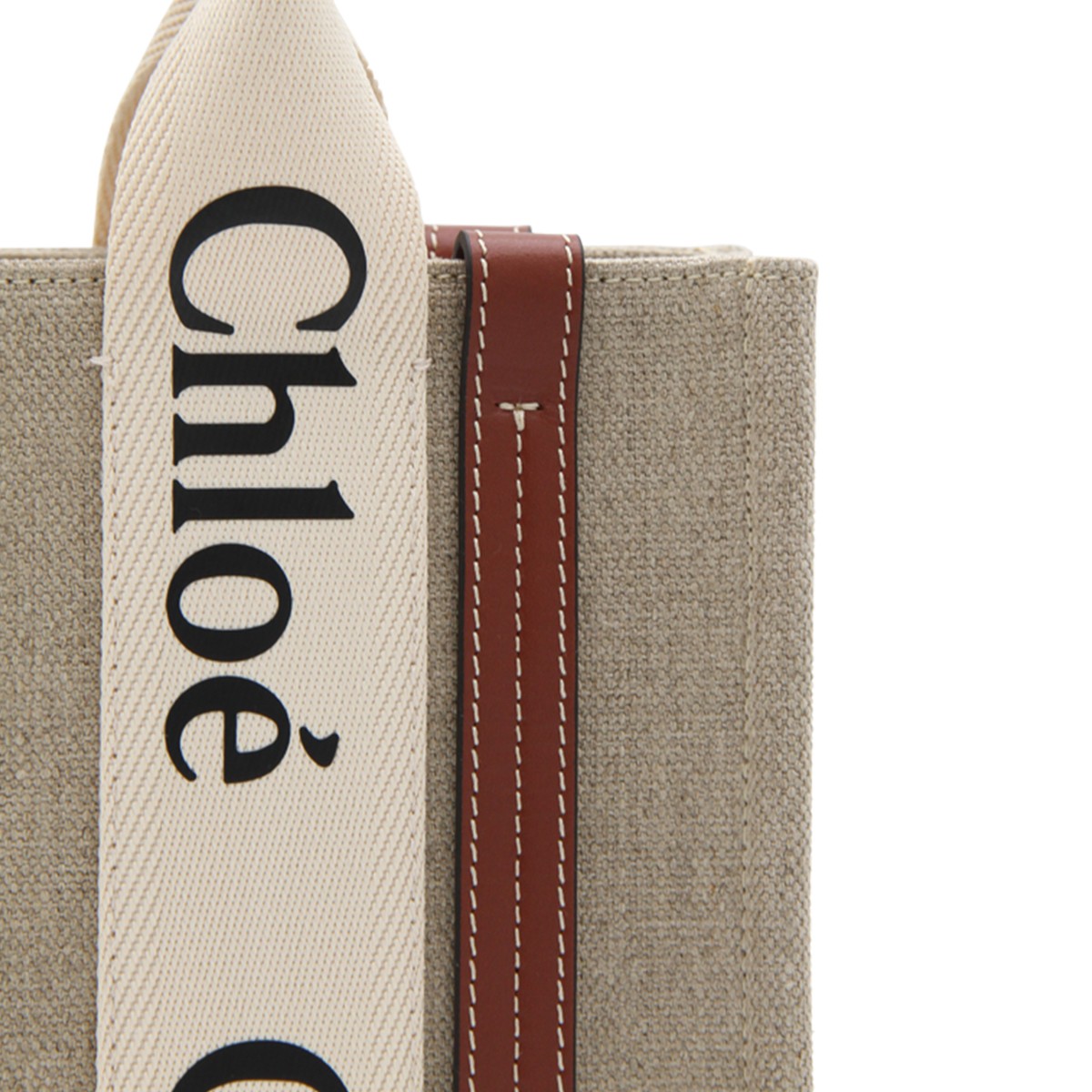 WHITE AND BROWN RAFFIA AND LEATHER...