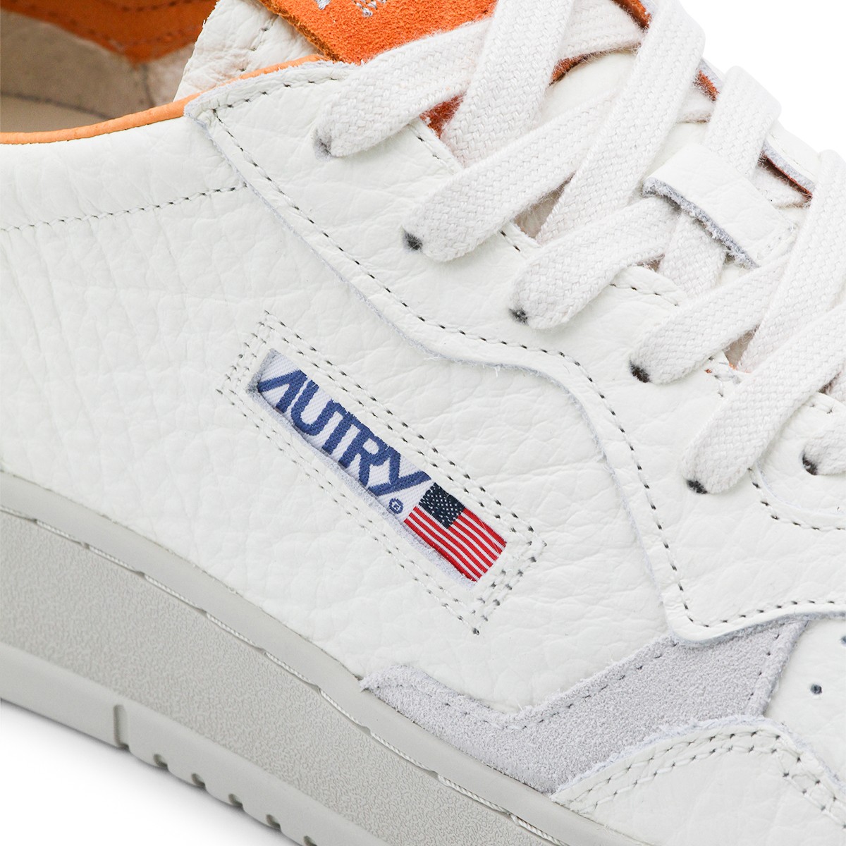 WHITE AND ORANGE LEATHER MEDALIST LOW...