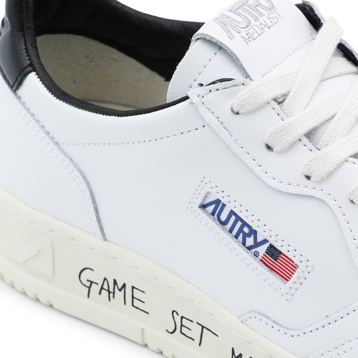 WHITE AND BLACK LEATHER MEDALIST...