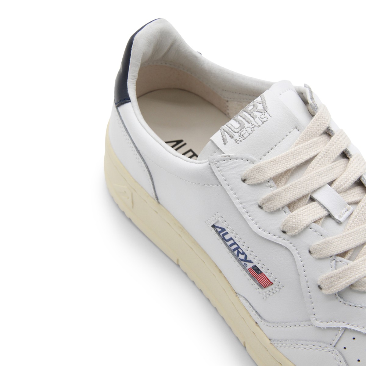 WHITE AND NAVY LEATHER SNEAKERS