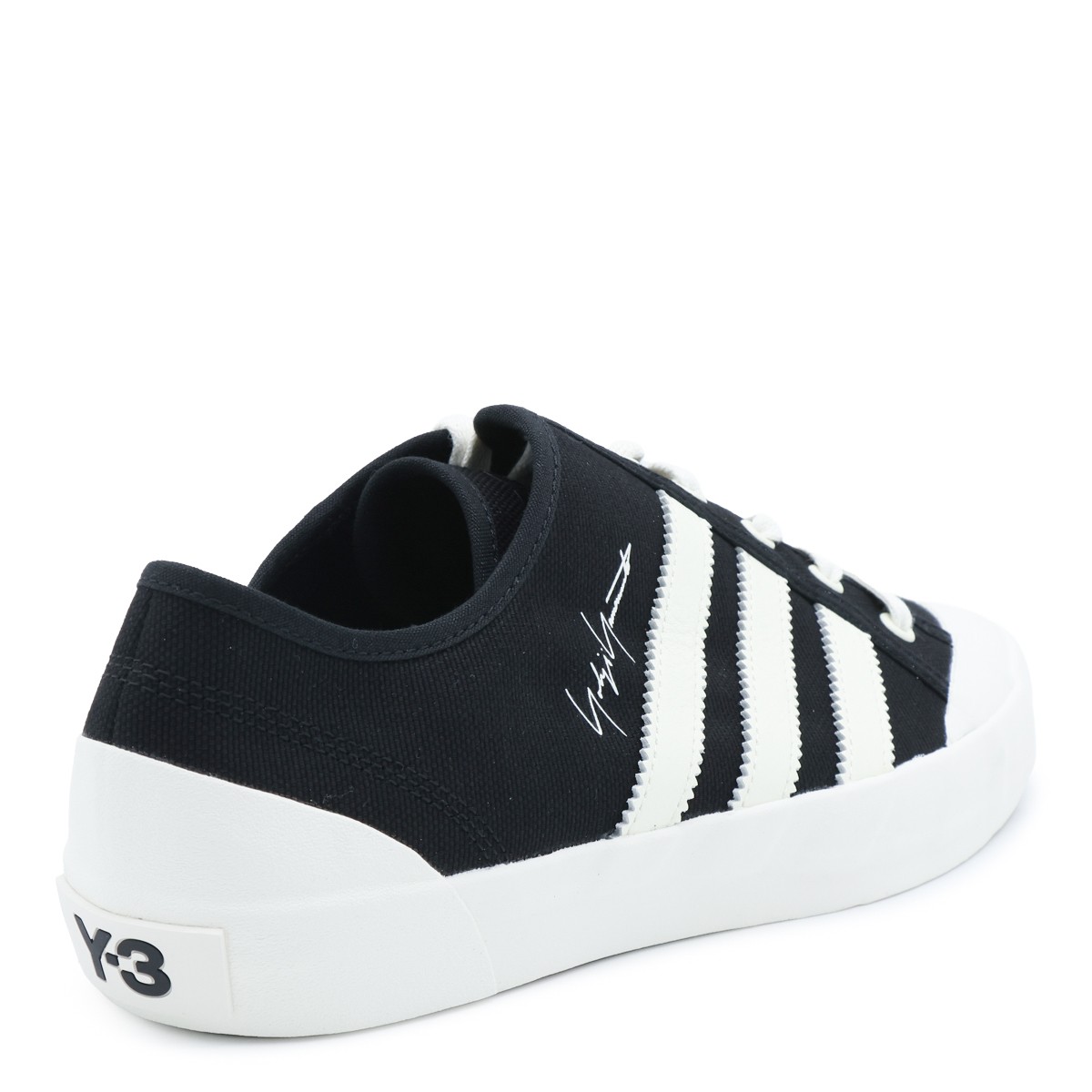 BLACK AND WHITE NISI SNEAKERS